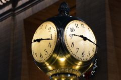 08-1 The Four-Faced Clock Close Up On Top Of The Information Booth Is Made From Opal Glass In New York City Grand Central Terminal Main Concourse.jpg